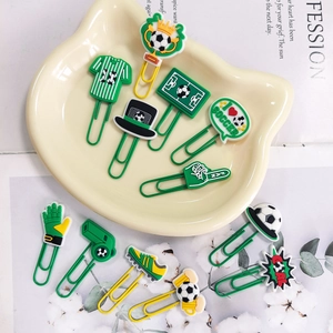 Detail showing 11 soccer-themed creative paper clips including jersey and trophy shapes