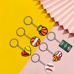 Cartoon PVC sports keychain collection featuring basketball, soccer, and baseball designs