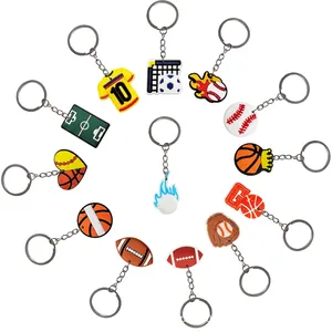 Set of 14 cartoon sports keychains featuring basketball football and baseball charms