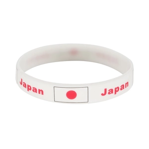White silicone sports wristband featuring a red Japan text and national flag design