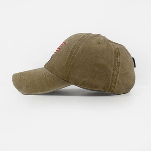 Close-up of side stripes on vintage washed cotton baseball cap with ventilation eyelets