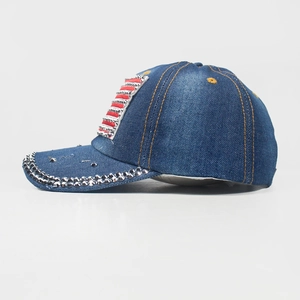 Blue denim baseball cap with American flag rhinestone pattern and silver studded brim