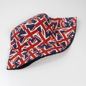 Close-up of Union Jack flag print details on a canvas bucket hat with red white and blue