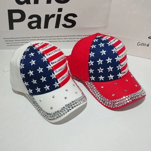Detail of USA flag baseball caps with shimmering rhinestones and star patterns