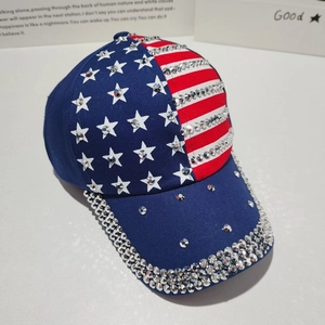 Macro detail of hand-set sparkling rhinestones on the American flag baseball cap visor