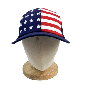USA flag baseball cap with stars and stripes design on a display mannequin head