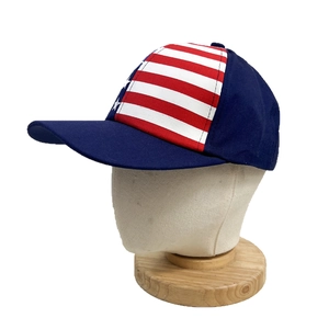 Classic American flag baseball cap with stars and stripes pattern on a model stand