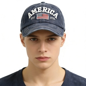Detailed close-up of navy blue vintage cap with America 1776 flag embroidery and stitching