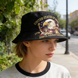 Detail of black cotton bucket hat featuring US 250th anniversary eagle and flag prints