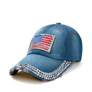 Blue denim baseball cap featuring rhinestone-studded US flag and crystal-lined brim
