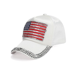 White satin baseball cap with rhinestone US flag patch and shimmering brim detail