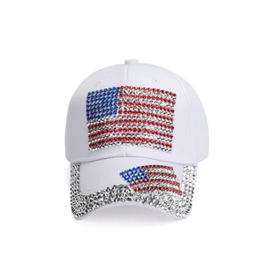White denim baseball cap with American flag rhinestone design and sparkly visor decoration