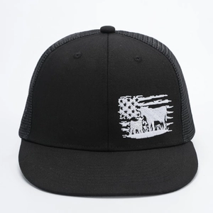 Black trucker hat with white bull and American flag embroidery on mesh back cap
