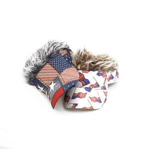 Detail of USA flag baseball caps featuring creative grey and brown faux hair top styling