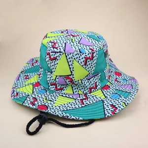 Close-up of colorful Memphis style geometric print sun hat with adjustable chin strap