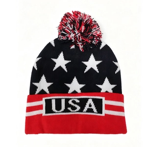 Winter knit beanie with USA flag patterns, pom-pom top, and warm thick star jacquard design