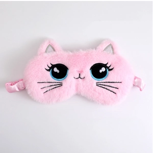 Close-up of pink plush cat sleep mask showing detailed blue embroidery and soft faux fur