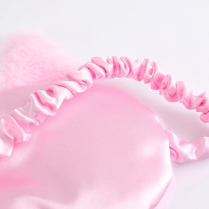 Pink plush cat sleeping eye mask with soft silk texture and elastic headband