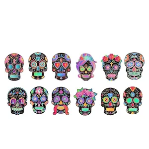 DIY Halloween scratch art set with 12 Mexican sugar skull designs for festive parties