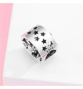 Macro shot of S925 sterling silver cat-themed bead with hollow star cutouts