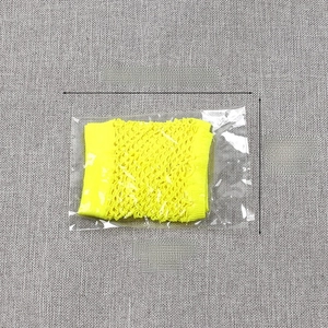 Detail view of neon yellow fishnet gloves with packaging dimensions in cm and inches