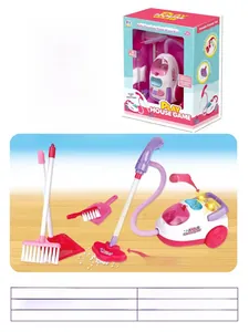 Kids toy vacuum set including pink cleaner and brush tools in a window display box