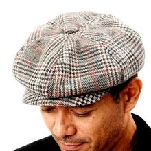 Classic plaid newsboy cap featuring a red and black Scottish check pattern for men