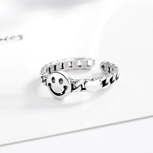 Vintage silver smiley face open ring with thick chain texture and small heart detail