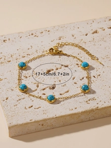 Golden turquoise chain bracelet featuring five round stones with 17+5cm size markers