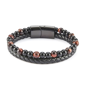 Detail of tiger eye beads and braided leather cord with black magnetic clasp