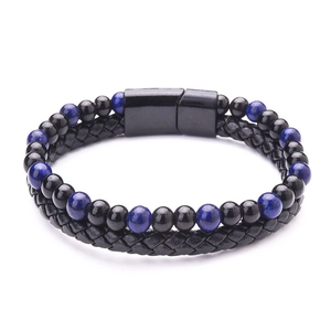 Detail of tiger eye beads and braided leather cord with black magnetic clasp