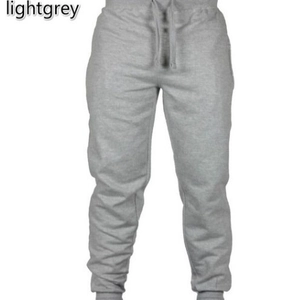 Men's light grey drawstring joggers with elastic cuffs for athletic casual wear
