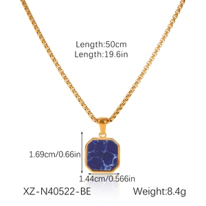 Detailed view of gold stainless steel necklace with blue stone pendant and size specs