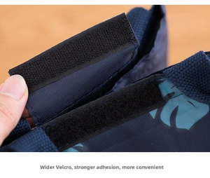 Detail view of thickened thermal lunch bag featuring wide velcro closure and tropical leaves