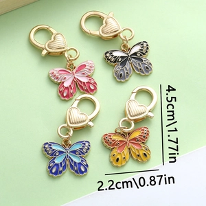 Detailed dimensions of four colorful enamel butterfly keychains with gold lobster clasps