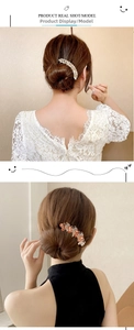 Detail of elegant pearl hair comb and champagne crystal hairpin set for updo styling