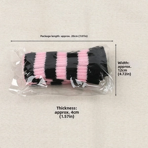 Detail showing knit striped arm warmers in pink and black packaging dimensions