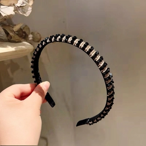 Handmade double-row beaded headband with black crystals and gold beads on a wide band