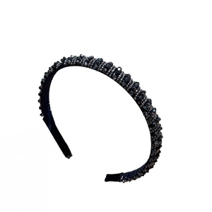 Elegant wide headband with double-row black faceted crystal beads on a slim frame