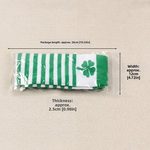 Detail showing St. Patrick's Day socks dimensions 26cm x 12cm in clear packaging