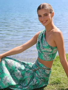Two-piece tropical palm print summer set with one-shoulder top and maxi skirt