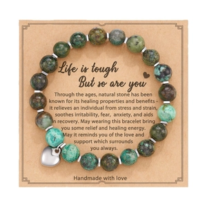Pink zebra jasper heart pendant beaded bracelet set on an English quote gift card