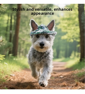 Close-up of pet sun hat with tropical leaf print and ear holes for dogs in outdoor setting
