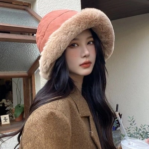 Winter faux fur plush bucket hat in orange suede for warmth and stylish outdoor protection