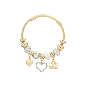 Detail of gold twisted bangle featuring swan charms and heart engraved with Thank You