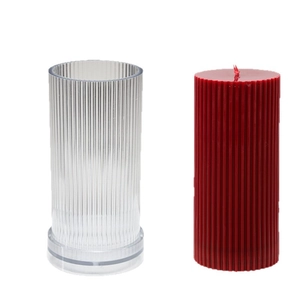 Cylindrical vertical stripe candle mold with finished red textured pillar candle