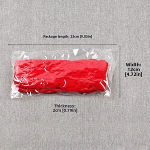 Macro detail of red cable-knit arm warmers in packaging with dimensions 23cm by 12cm
