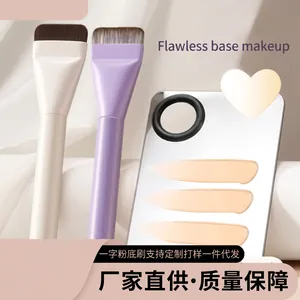 Flat foundation brushes with stainless steel makeup mixing palette and foundation swatches