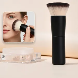 Flat head makeup brush with matte black handle and dual-color fiber bristles for foundation