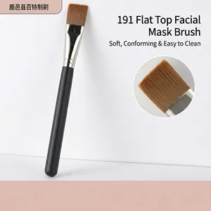 Detailed view of the soft bristles and silver ferrule of the flat makeup brush